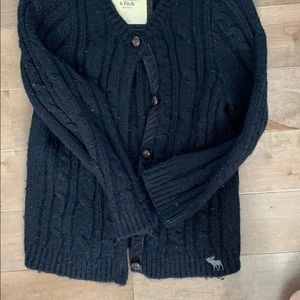 Dark blue sweater with buttons